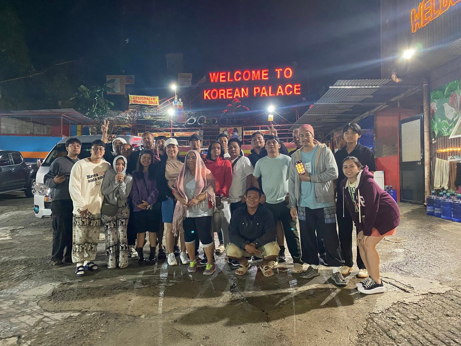 A team member presenting ideas on a whiteboard